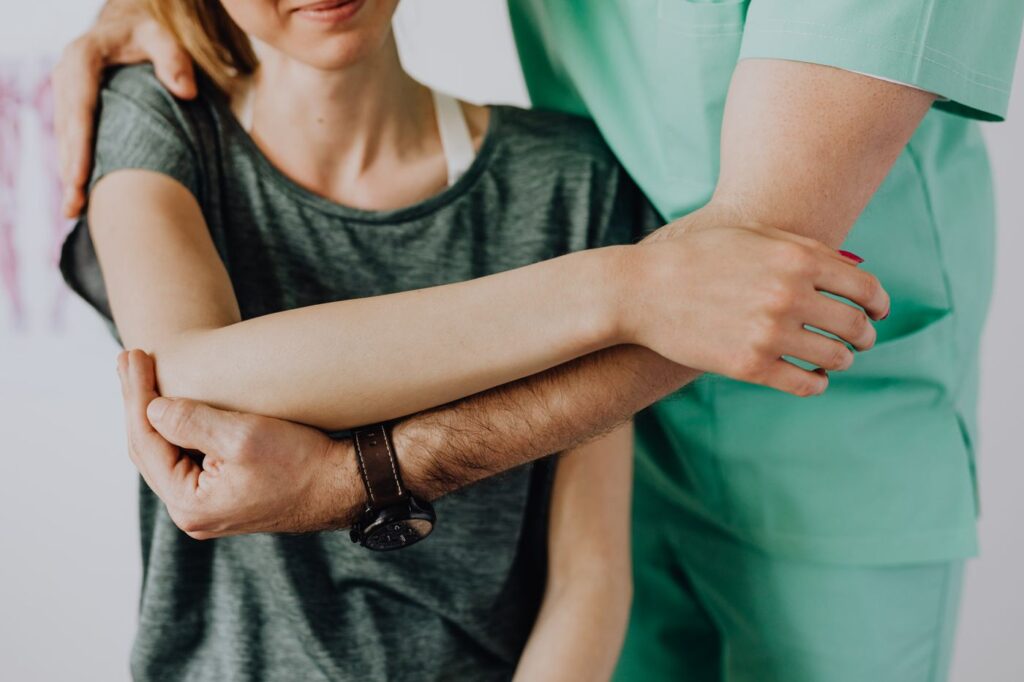 Physiotherapist assessing a patient during a first appointment in Ottawa